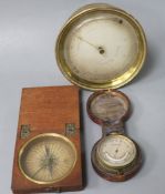 A Victorian brass cased aneroid barometer, a pocket barometer and a George III pocket compass