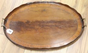 A George III satinwood banded mahogany two handled tea tray width 68cm