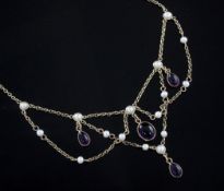 A Victorian style 9ct gold, cabochon amethyst and seed pearl drop necklace, 60cm.