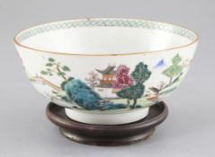 A Chinese famille rose 'landscape' bowl, Qianlong period, finely painted with figures in a river