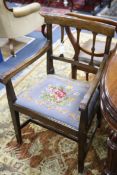 A set of five late George III mahogany dining chairs (one arm, for single), with floral tapestry