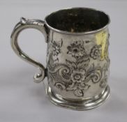 An early George II silver mug with later embossed decoration, Richard Gurney & Co, London, 1728,