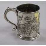 An early George II silver mug with later embossed decoration, Richard Gurney & Co, London, 1728,