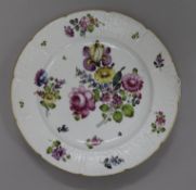 A German Meissen style dish, painted with floral bouquets