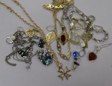 A 9ct gold pendant on a 9ct gold chain and a small group of assorted jewellery including costume and