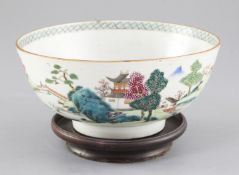 A Chinese famille rose 'landscape' bowl, Qianlong period, finely painted with figures in a river