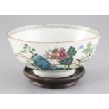 A Chinese famille rose 'landscape' bowl, Qianlong period, finely painted with figures in a river