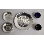 A 1970's silver stand, two white metal dishes inset with coins, a pair of Victorian silver salts and