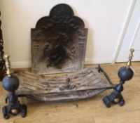 A pair of fire dogs and a cast iron fireback Fire basket W.90cm Fireback W.50cm