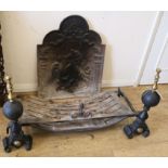 A pair of fire dogs and a cast iron fireback Fire basket W.90cm Fireback W.50cm