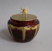 A modern Theo faberge silver gilt lidded ruby glass jar, with ballerinas finial, Birmingham, 2001,