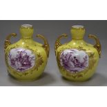 A pair of Dresden, in the Meissen style, yellow and mauve vases