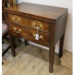 A George III mahogany two drawer side table, on square supports W.67cm