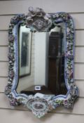 A Dresden flower encrusted wall mirror