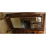 A mahogany cheval mirror W.68cm