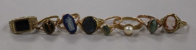 Eight assorted 9ct gold and gem set rings, including, hematite, cat's eye, cameo, black onyx and