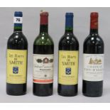 A bottle of Yon-Figeac, St. Emilion, 1998, two bottles of Les Haut de Smith, Pessac-Leognan, 1990