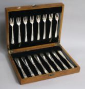 A cased set of eight pairs of George VI silver fish eaters, Roberts & Belk, Sheffield, 1944.