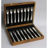 A cased set of eight pairs of George VI silver fish eaters, Roberts & Belk, Sheffield, 1944.