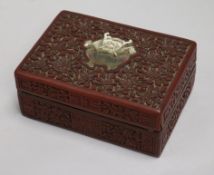 A Chinese red lacquer box and cover