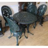 A garden table and four chairs W.69cm