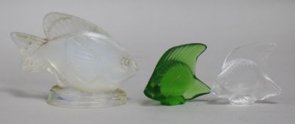 Two Lalique crystal fish and an opalescent glass fish