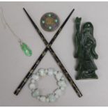 A Chinese carving, bracelet, 2 pendants and a pair of chop sticks