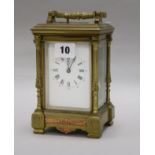 A carriage clock H.16cm x W.11cm