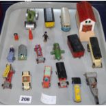 A group of nineteen late 1920's painted wooden models, including a garage building with ramp, a