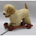 A Triang pull-a-long barking dog L.27cm