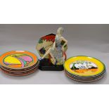 Ten reproduction Clarice Cliff plates and a Kevin Francis figure "Tea with Clarice Cliff"