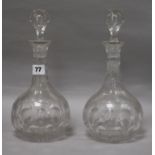 A pair of Victorian cut glass decanters