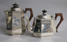 A George V silver teapot and hot water jug, William Neale & Son Ltd, Birmingham, 1930.