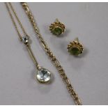 A 9ct gold and aquamarine drop pendant, a 9ct chain and a pair of 9ct gem set earrings.