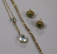 A 9ct gold and aquamarine drop pendant, a 9ct chain and a pair of 9ct gem set earrings.