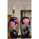 A pair of Moorcroft magnolia pattern table lamps