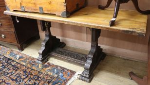 An oak refectory table W.180cm