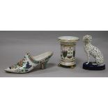 A tinglaze famille verte model of a shoe, a Staffordshire dalmation and an English porcelain spill