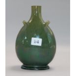 A 19th century Chinese dark green celadon glazed onion shaped vase