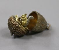 A Stuart Devlin style silver gilt surprise "acorn" pendant, 25mm.