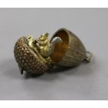 A Stuart Devlin style silver gilt surprise "acorn" pendant, 25mm.