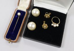 A 9ct gold and triple cultured pearl ring, a pair of gold and pearl earclips, a pair of simulated