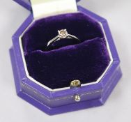 A platinum and natural fancy dark brown 0.48ct solitaire diamond ring with GIA certificate dated