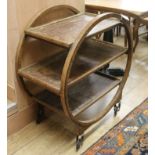 A 1930's oak tea trolley. W.75cm