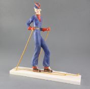 A William Goebel Art Deco pottery figure of a woman skier, impressed model no.FF37/1 and monogrammed