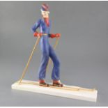 A William Goebel Art Deco pottery figure of a woman skier, impressed model no.FF37/1 and monogrammed