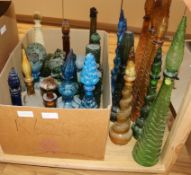 An extensive collection of 1950's coloured glass decanters