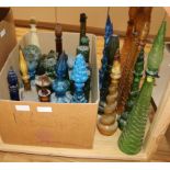 An extensive collection of 1950's coloured glass decanters