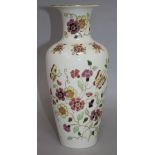 A Zsolnay vase decorated with butterflies and flowers