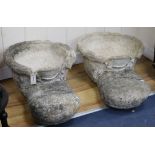 A pair of moulded concrete planters formed as boots W.48cm approx.